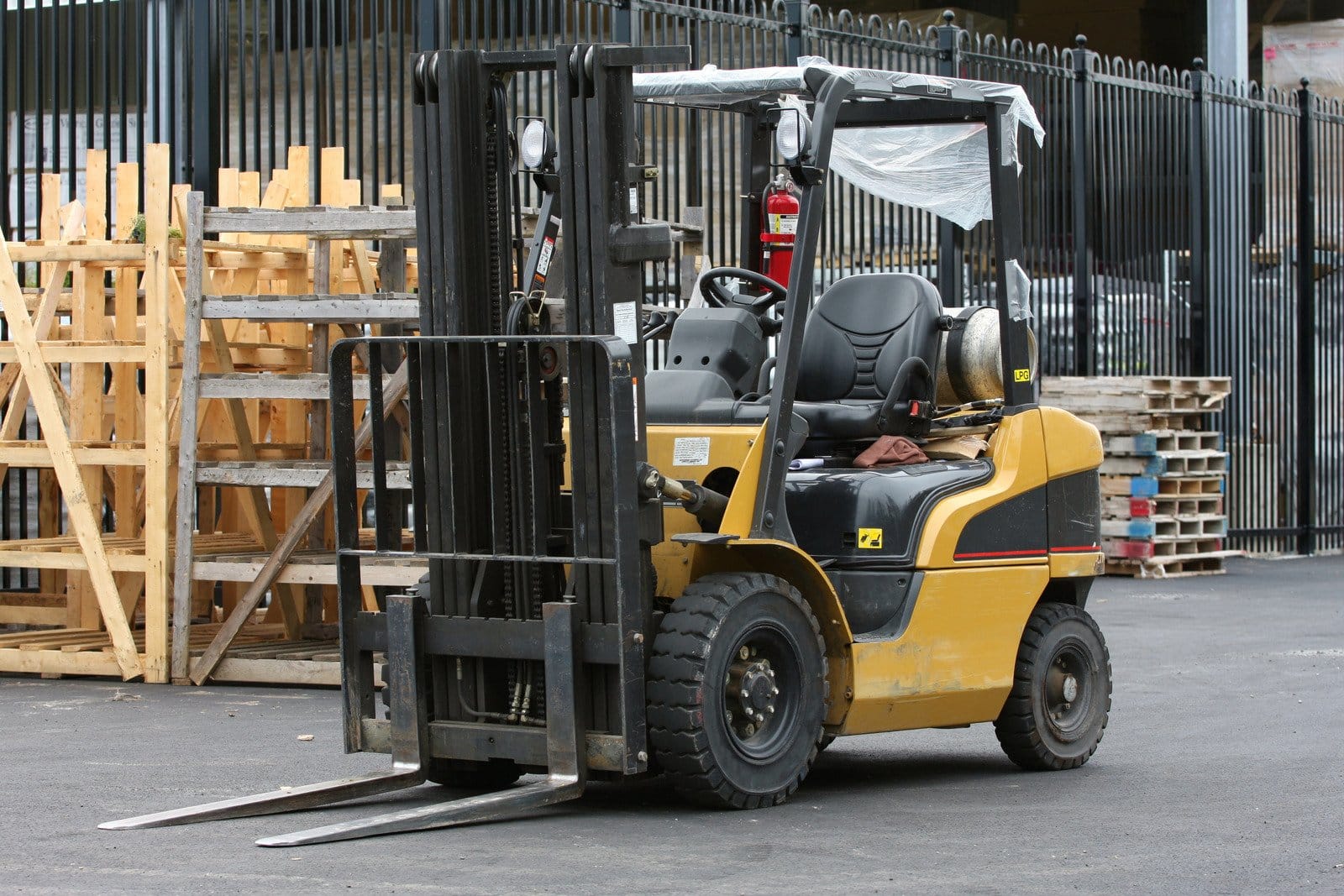 yllow forklift parked in a warehouse in Texas