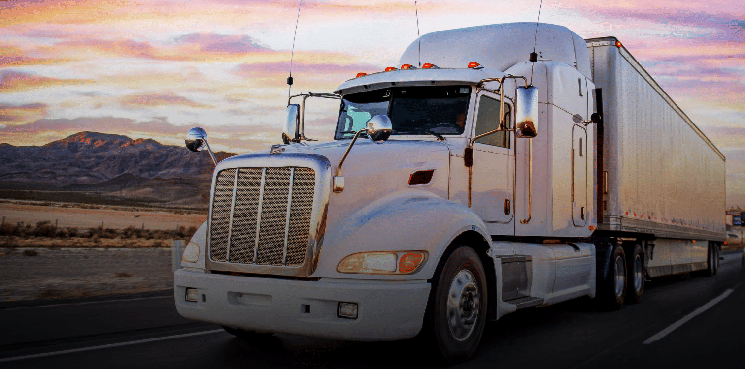 white 1-wheeler driving at sundown across Texas