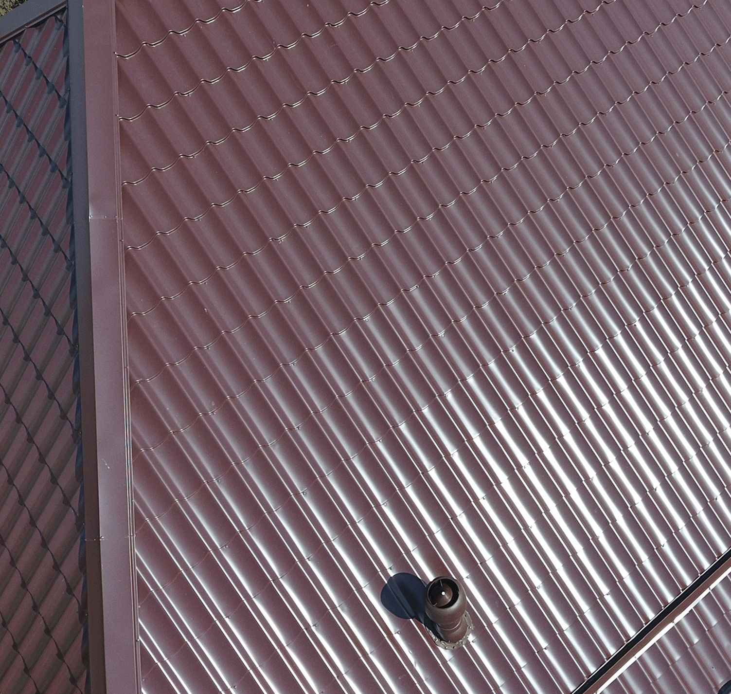 sun shining on brown metal roof