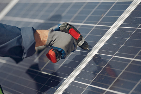 contractor installing integrated solar roof panels contractor installing integrated solar roof panels