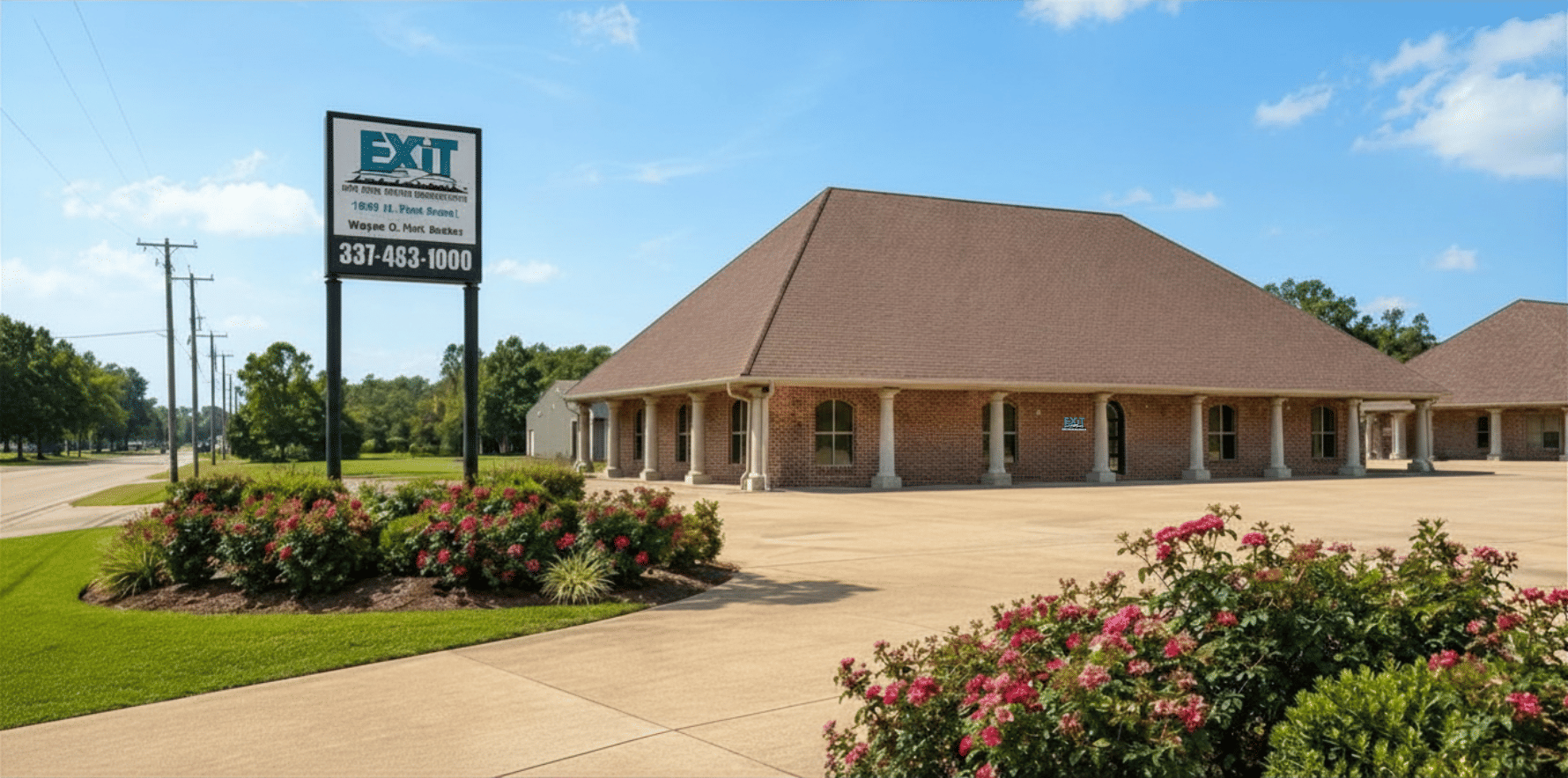 EXIT Real Estate Consultants office in DeRidder, Louisiana, with landscaped grounds and EXIT signage.