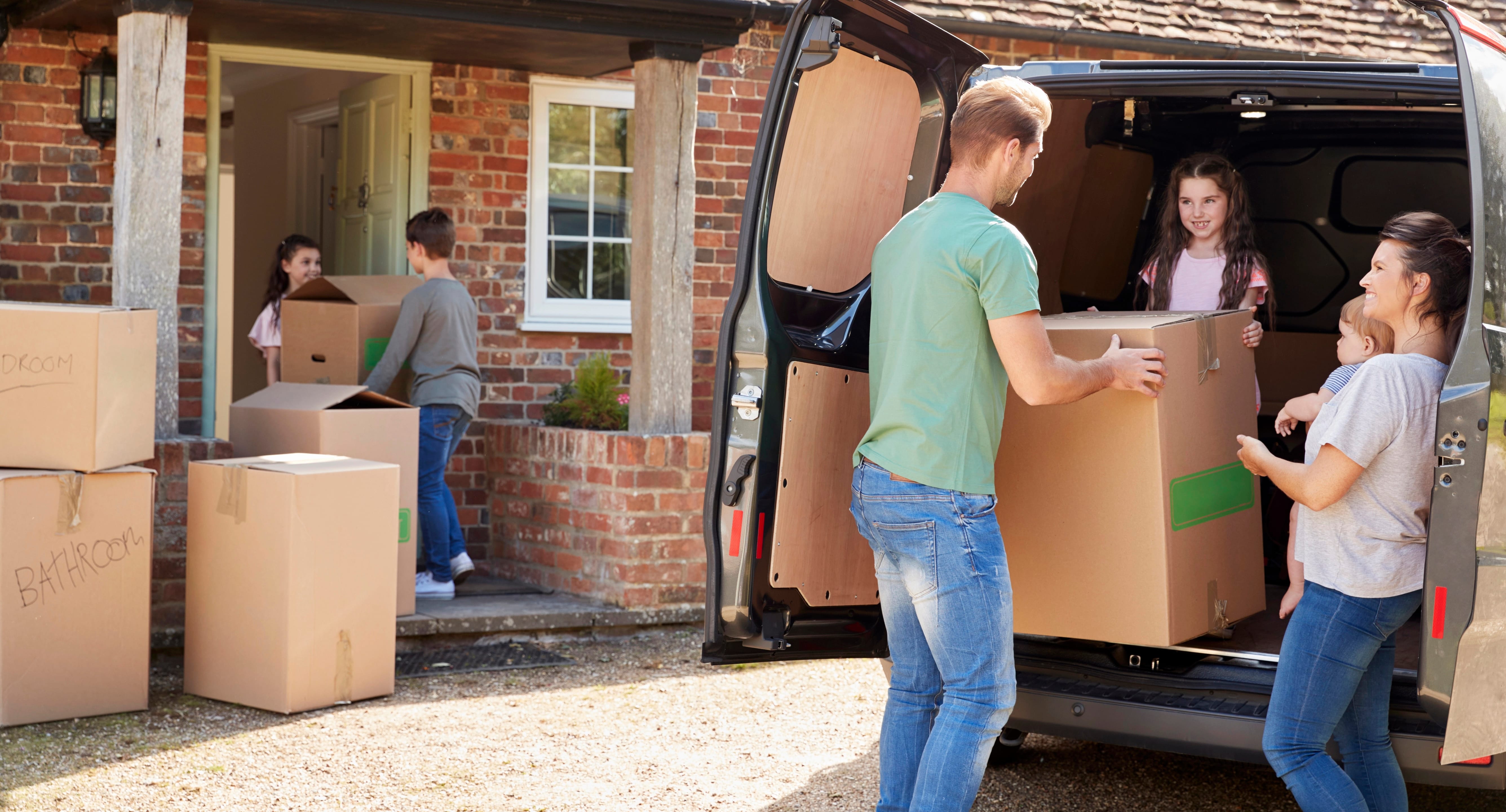 Military family unpacking after moving near Fort Polk
