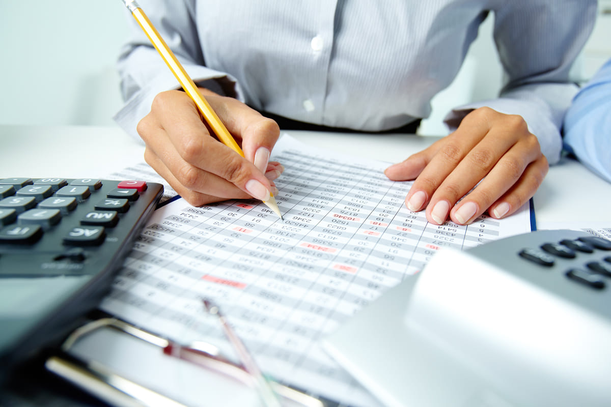 Business consultant meeting with client about construction accounting and financial strategy