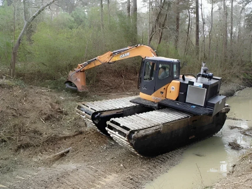 Swamp Excavator traveling through a muddy wet area in a forest
