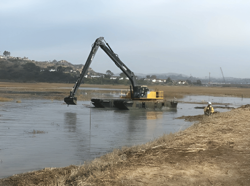 amphibious excavator in water