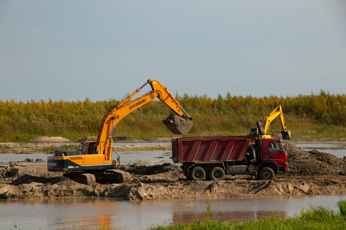 Hyundai excavator in wetland environemnt