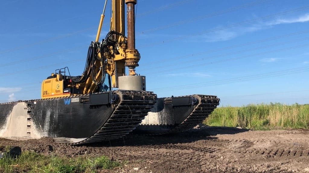 Cat Amphibious Excavator on dirt terrain