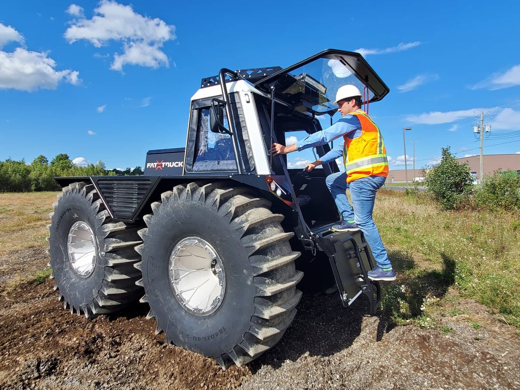 Fat Truck operator getting into Fat Truck