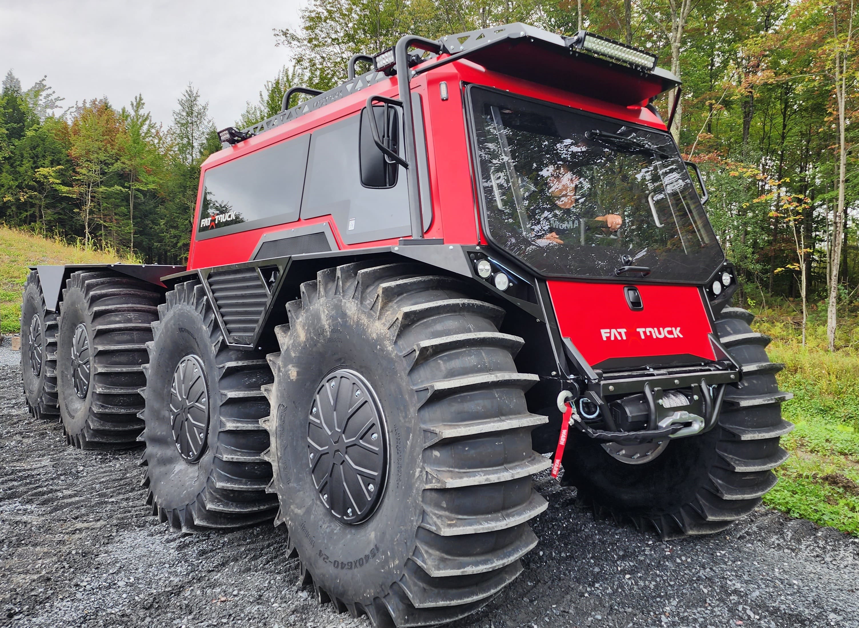 red fat truck with a closeup on the tire