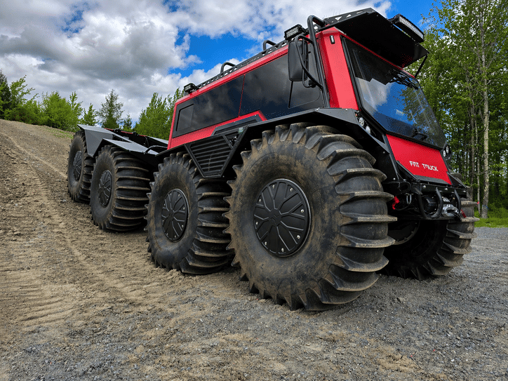 fat truck sitting on dirty road