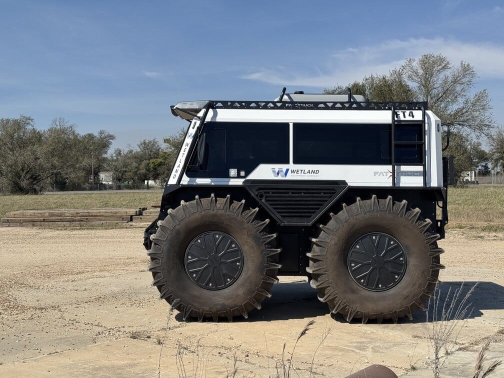 fat truck sitting on dirty road