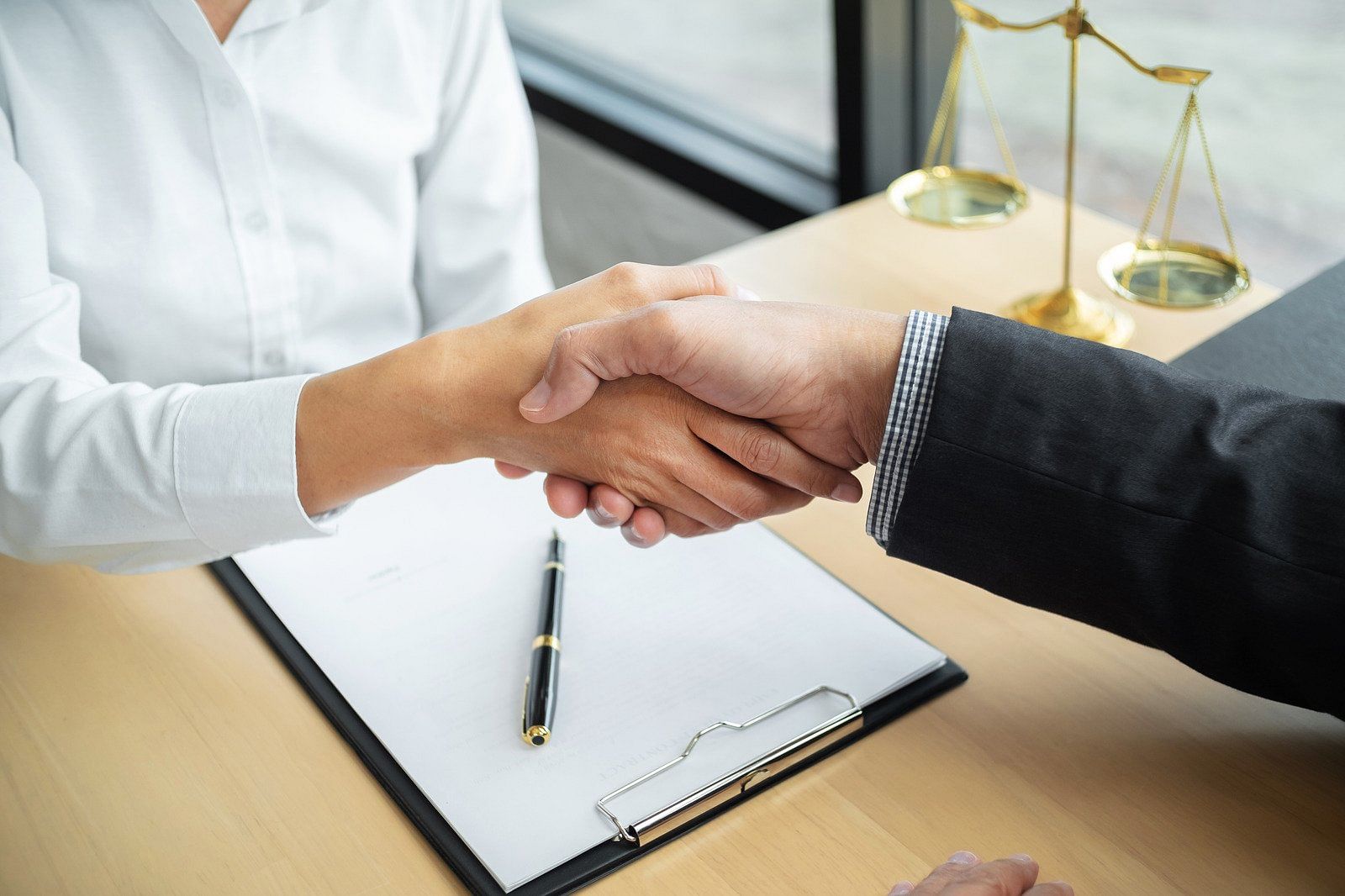 Two people shaking hands