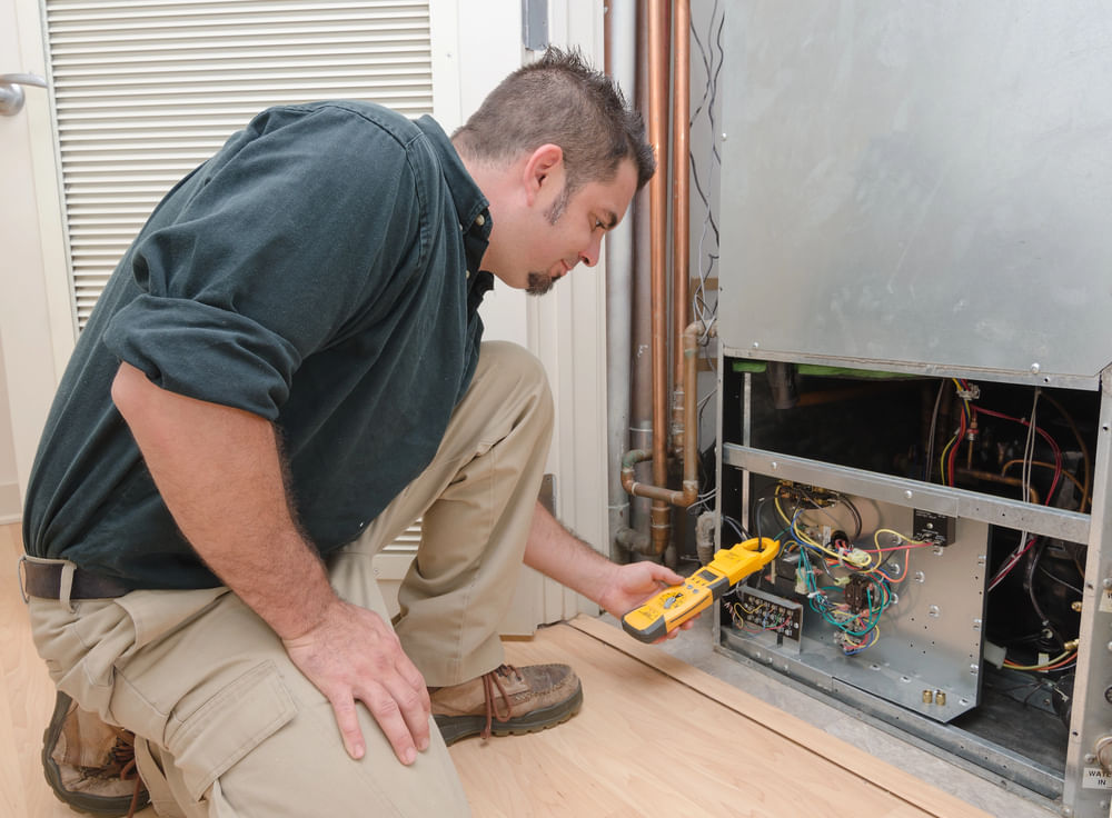Repairman looking at a