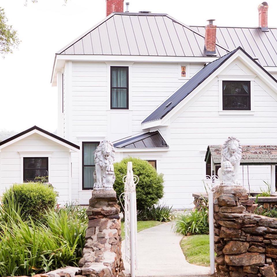 white house with spanish tile roof