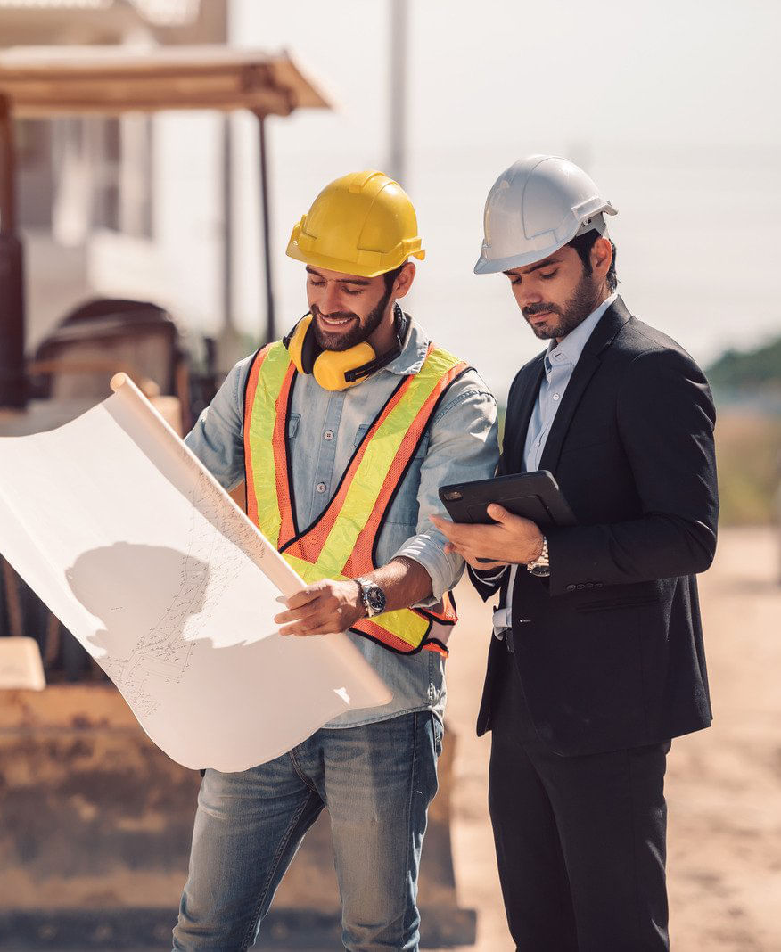 civil engineer and construction worker in construction site