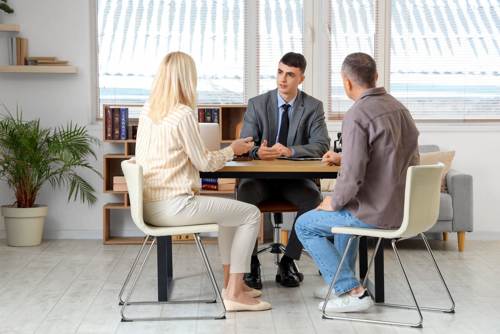 lawyer working with couple in the office