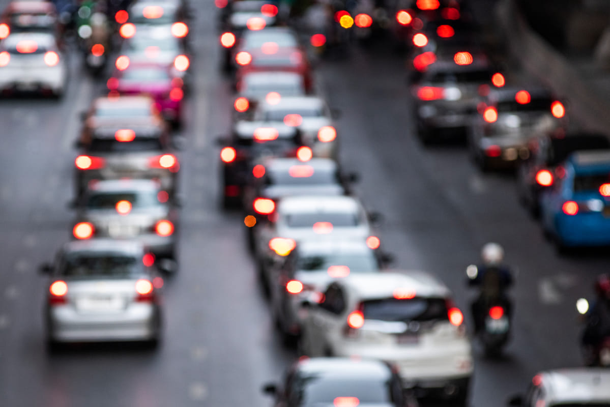 cars stuck in traffic on a highway
