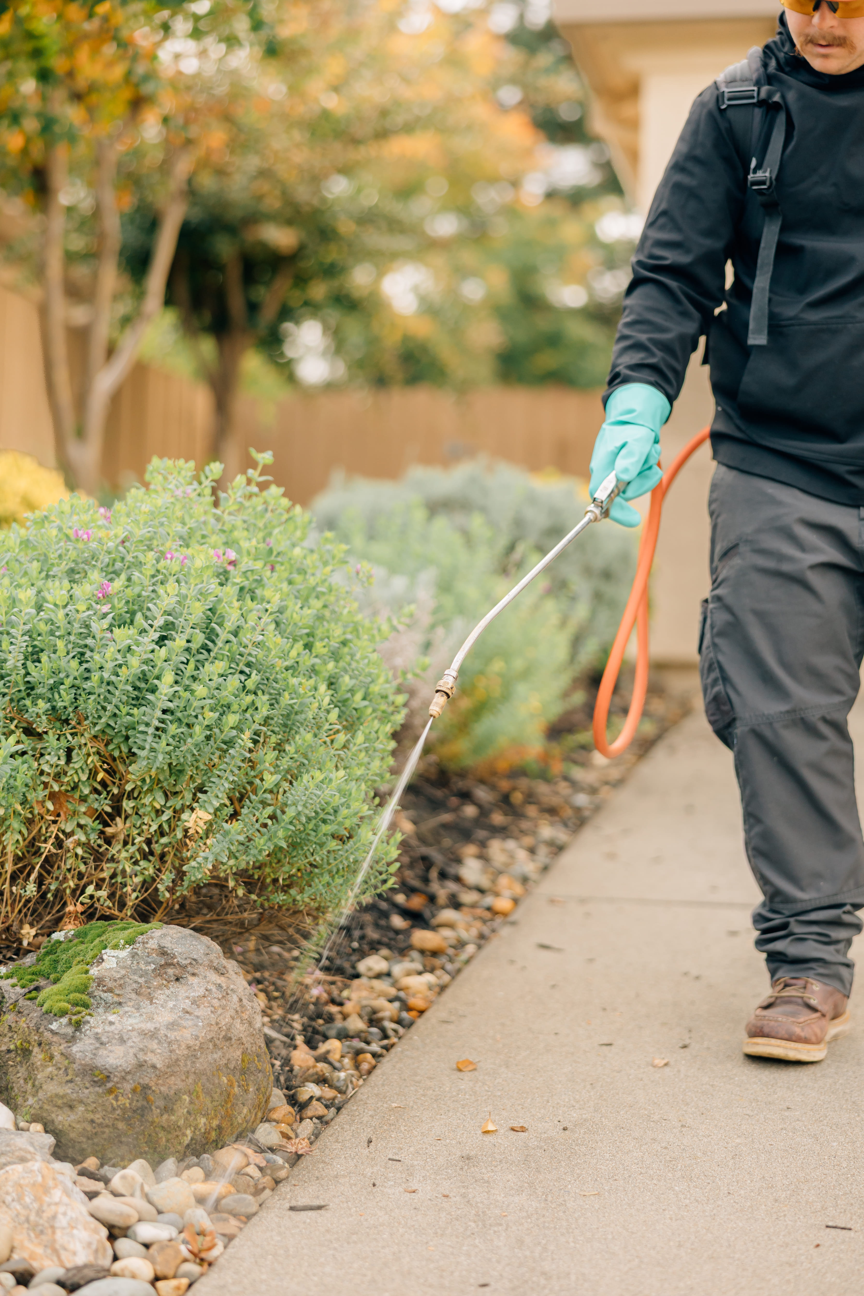 red brick building with brown trim on a clear sky day