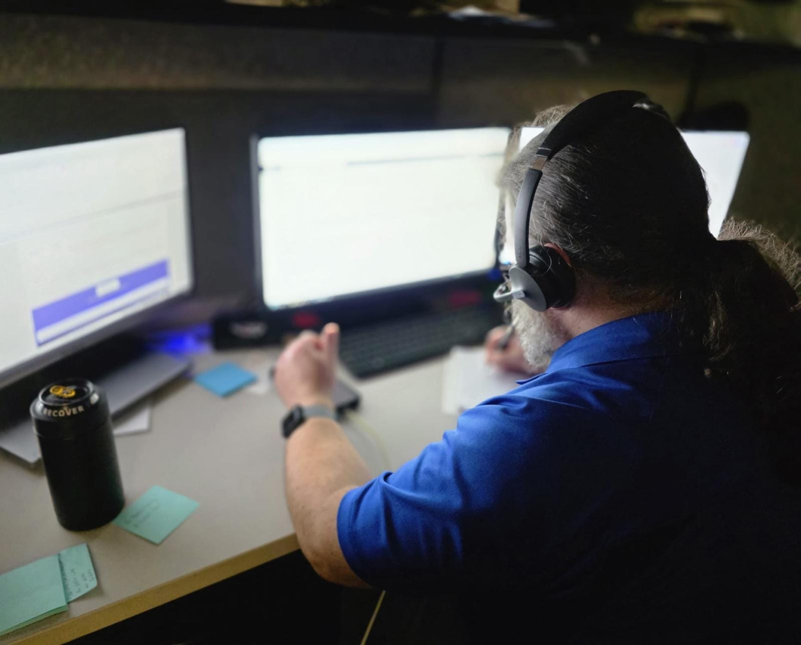 Man speaking to colleague
