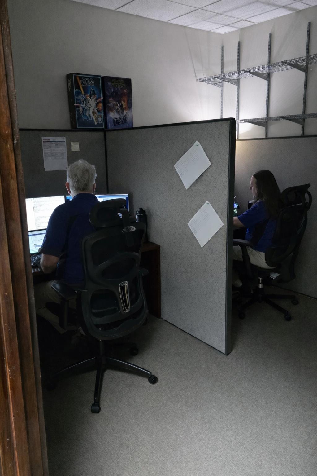 Two Micoland Coworkers smiling during a conversation
