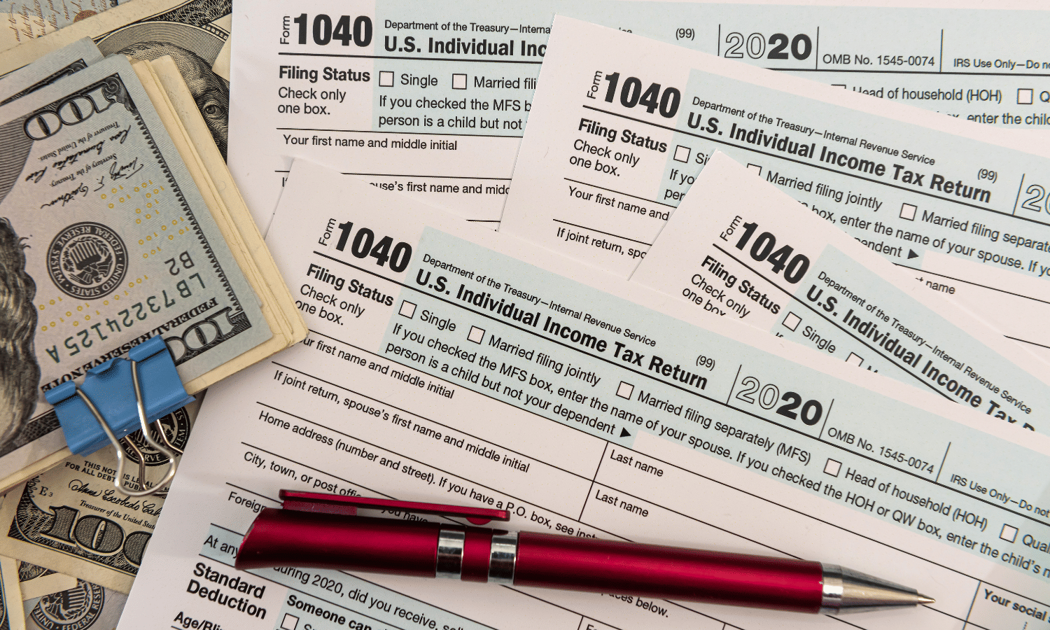 tabletop filled with 1040 forms