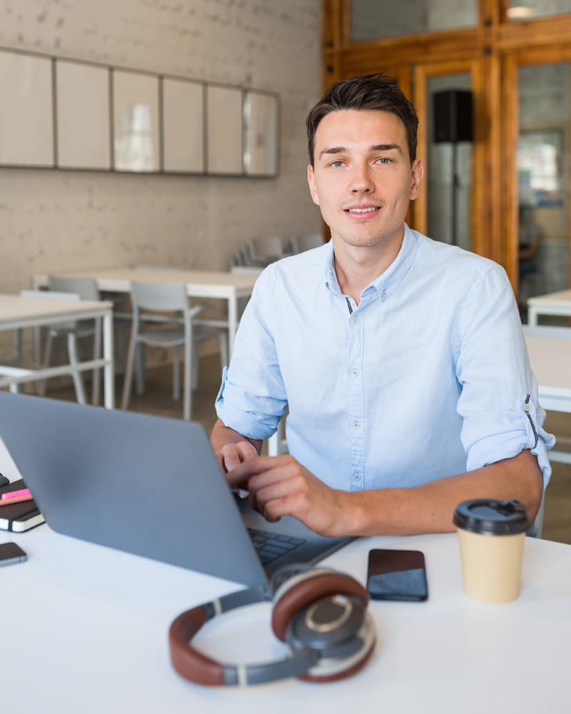 Wayne PA entrepreneur reviewing business structure options on laptop at office desk