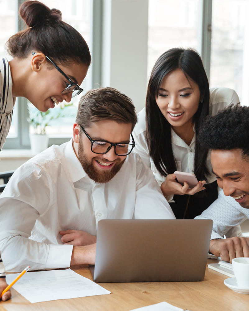 Small business owners discussing LLC and corporation options during entity selection meeting