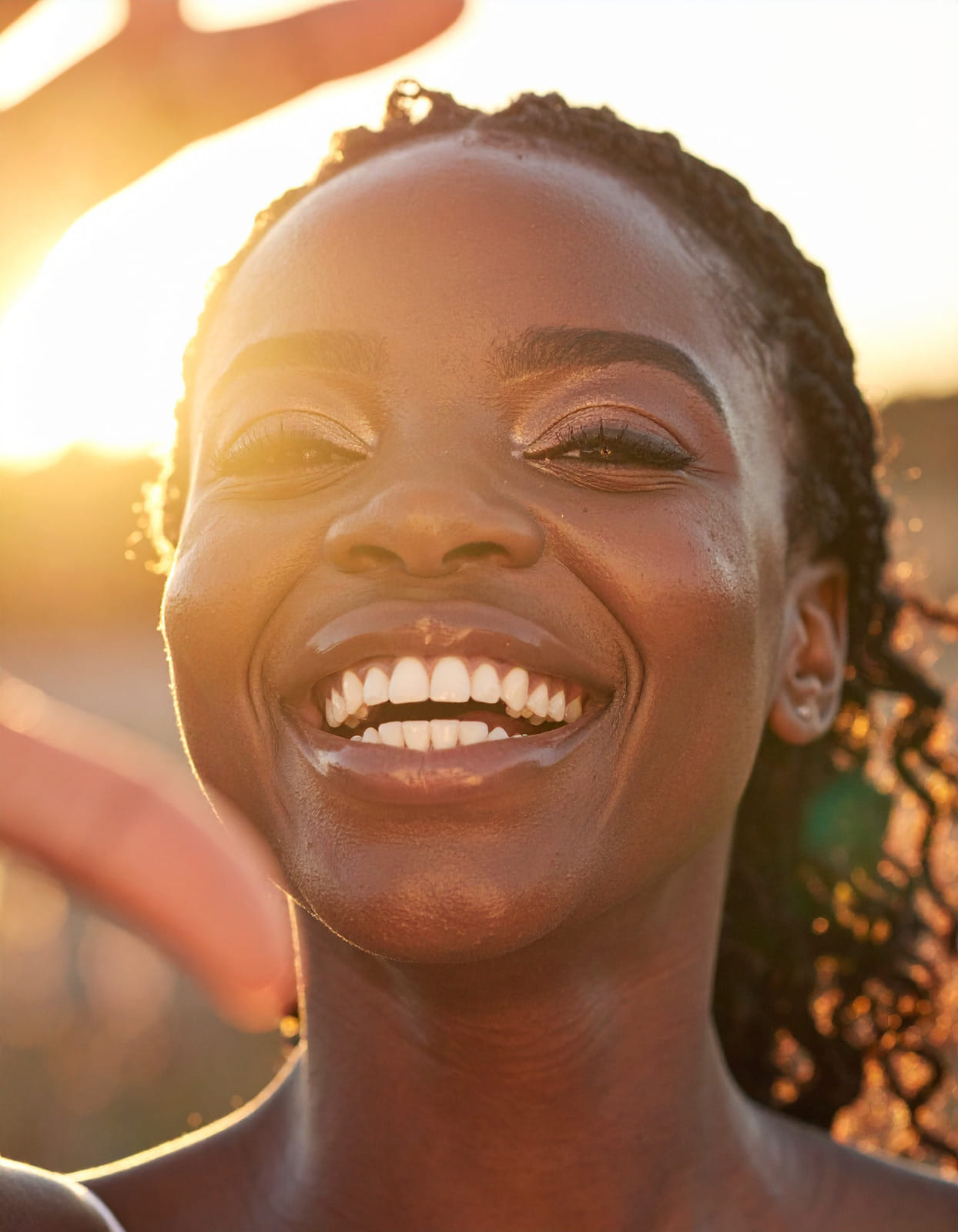 Woman smiling with straight teeth after orthodontic treatment
