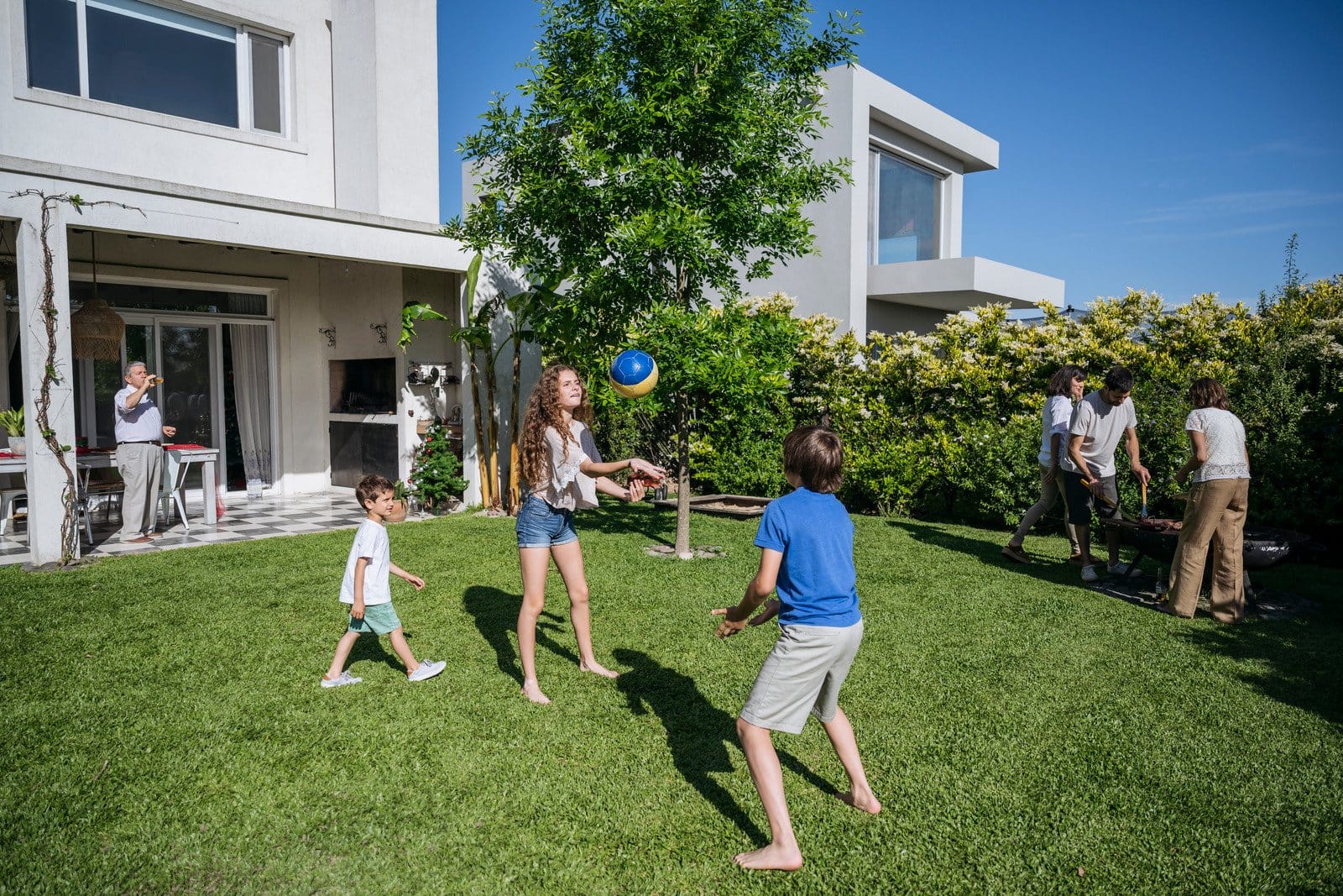 Family enjoying backyard protected by eco-friendly pest control services
