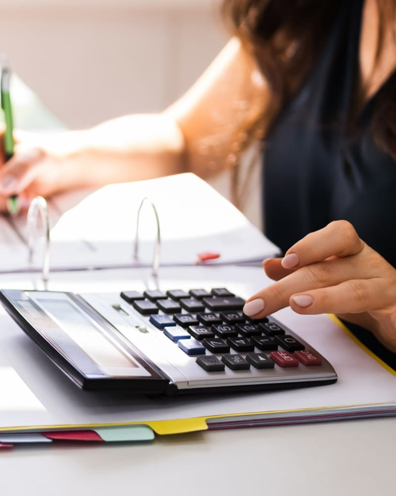 Virtual Accountant Calculating Tax