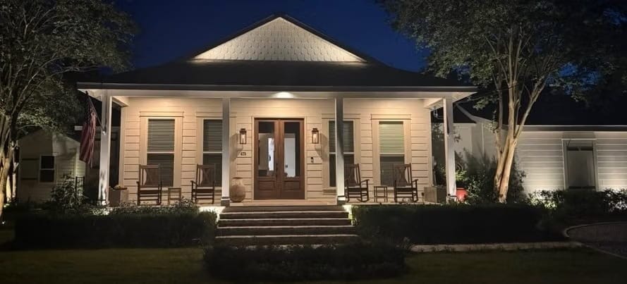 Modern Style home in Covington, LA, with track lighting illuminating the exterior