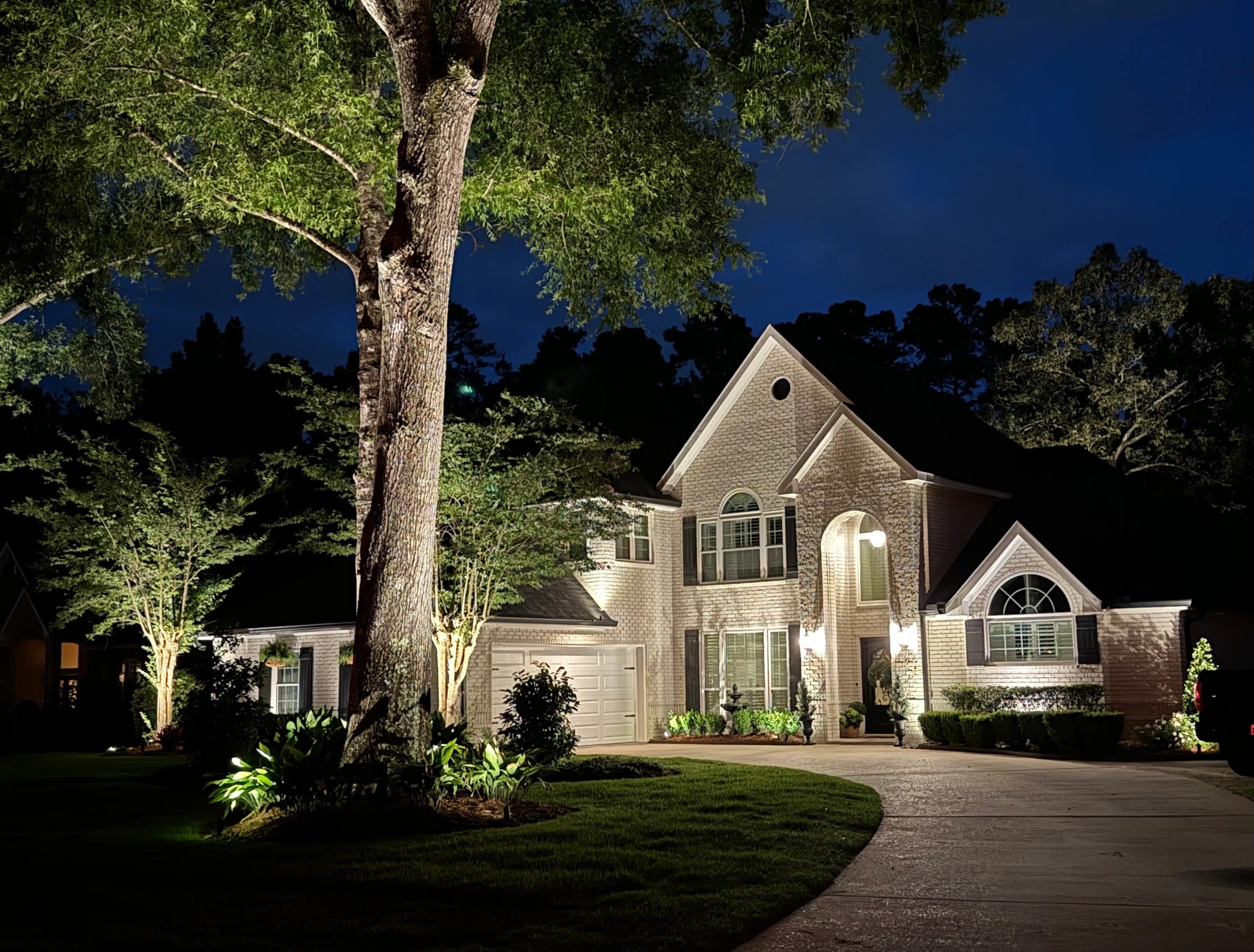 outdoor white lighting on home