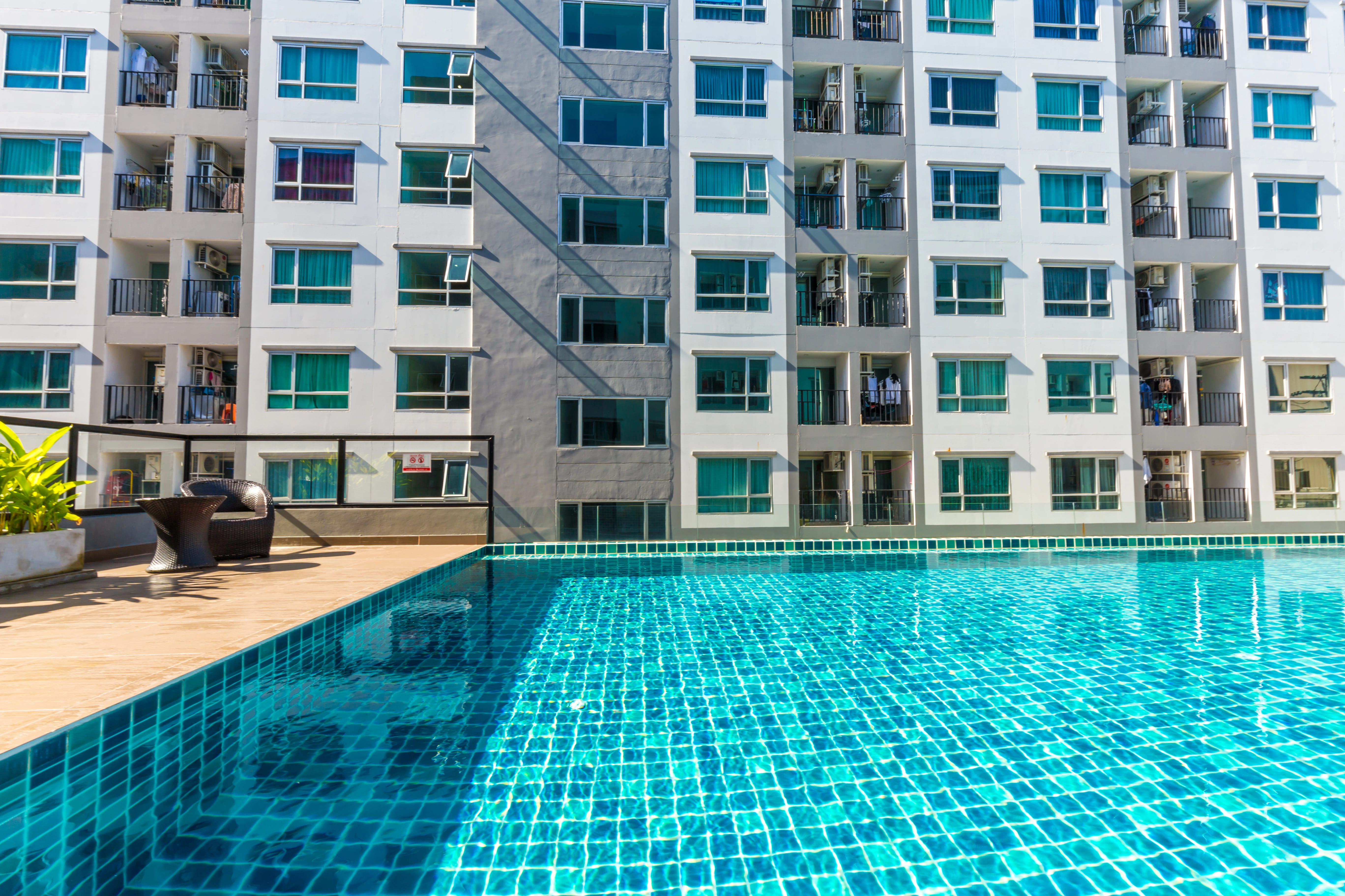 blue tile pool in apartment complex