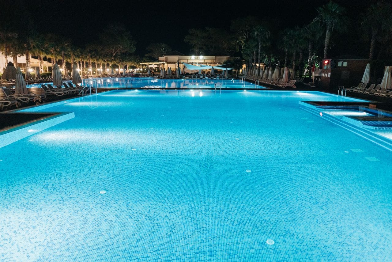white and blue pool tile in inground pool