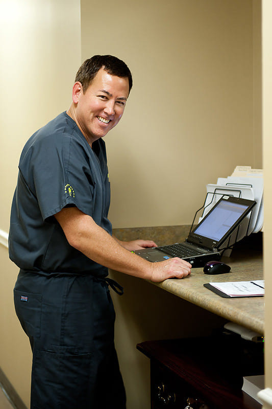 ENT provider reviewing patient information during a clinic visit at Alabama ENT & Allergy in Birmingham