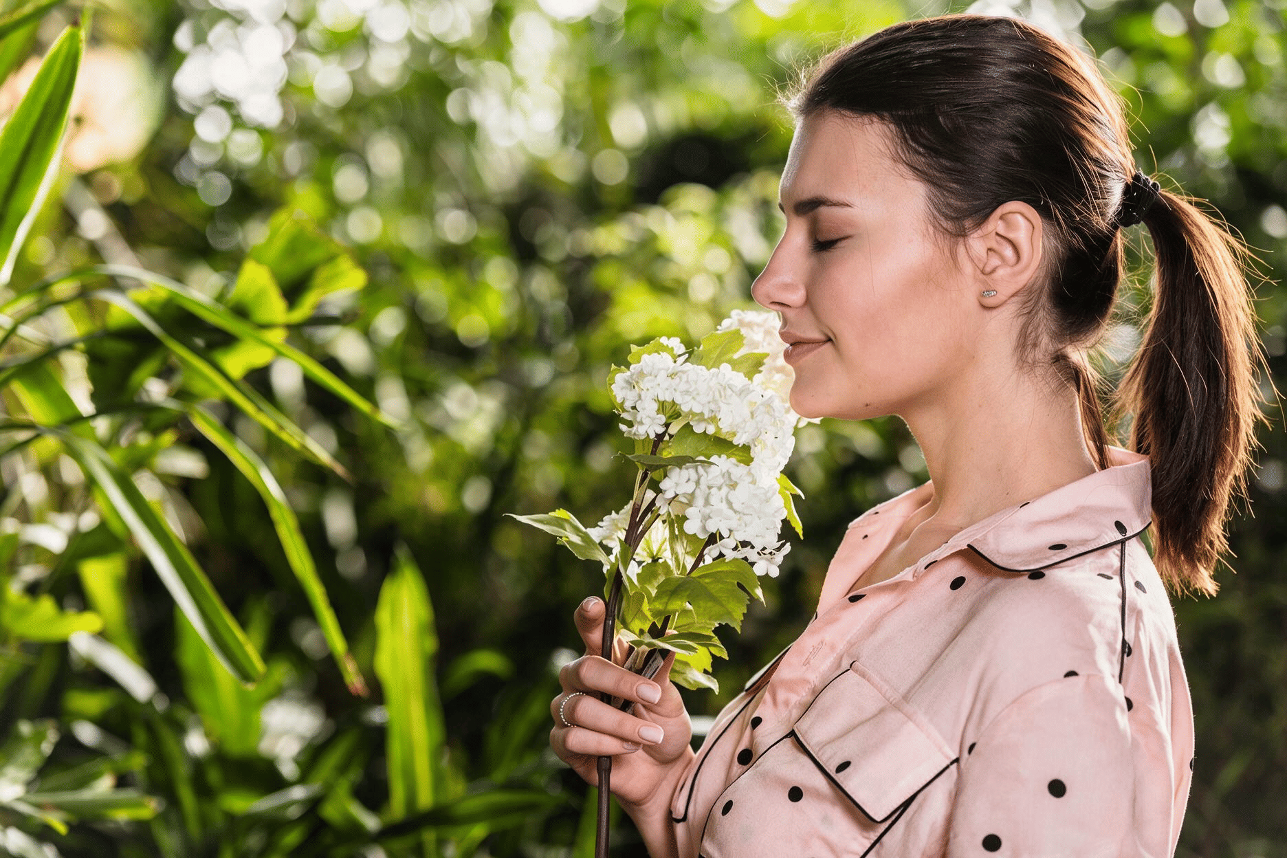 Birmingham Woman Smelling Flowers