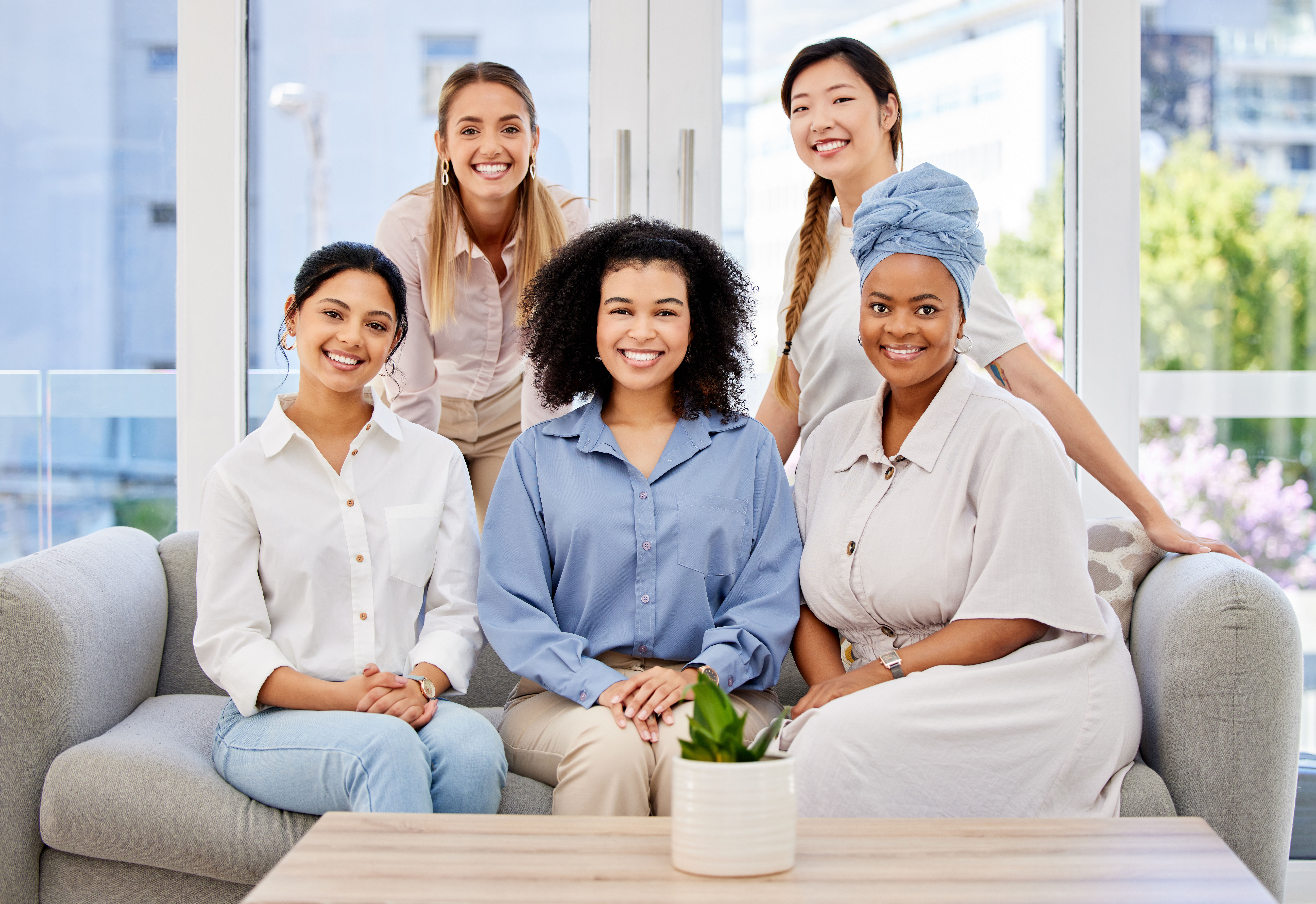 diverse people smiling in the camera