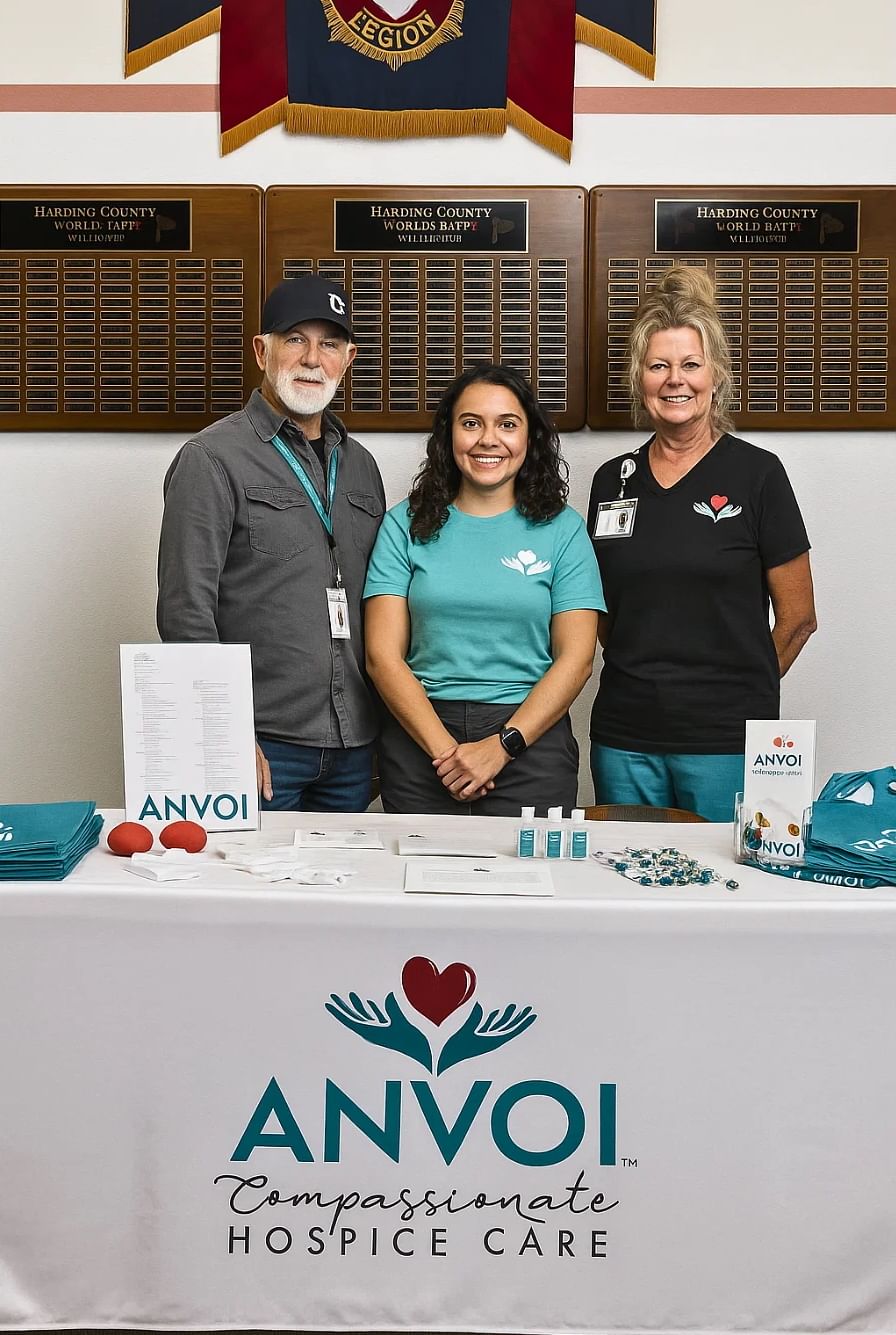 Anvoi Care team next to table