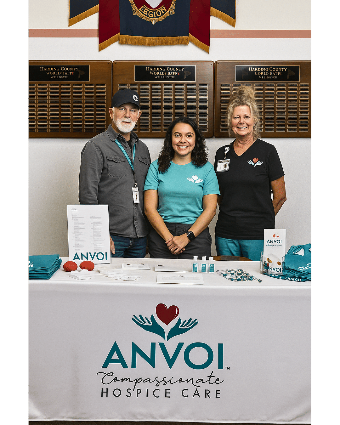 Anvoi Care team next to table