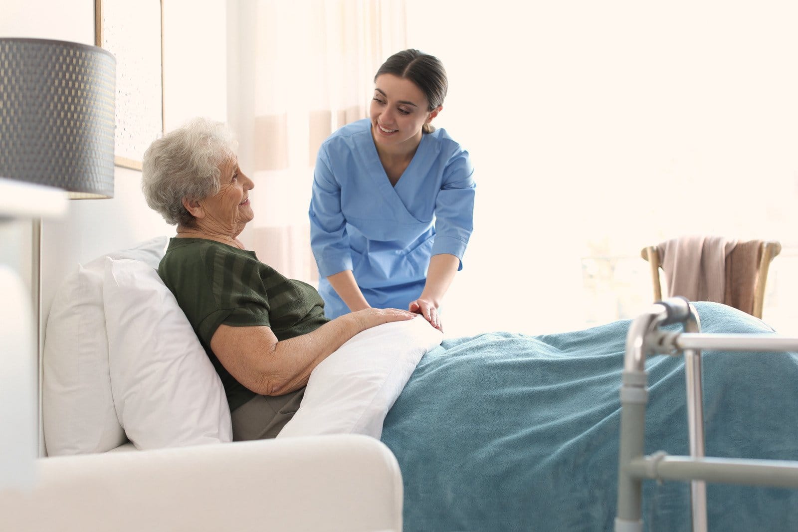 care worker with elderly woman in a hospice