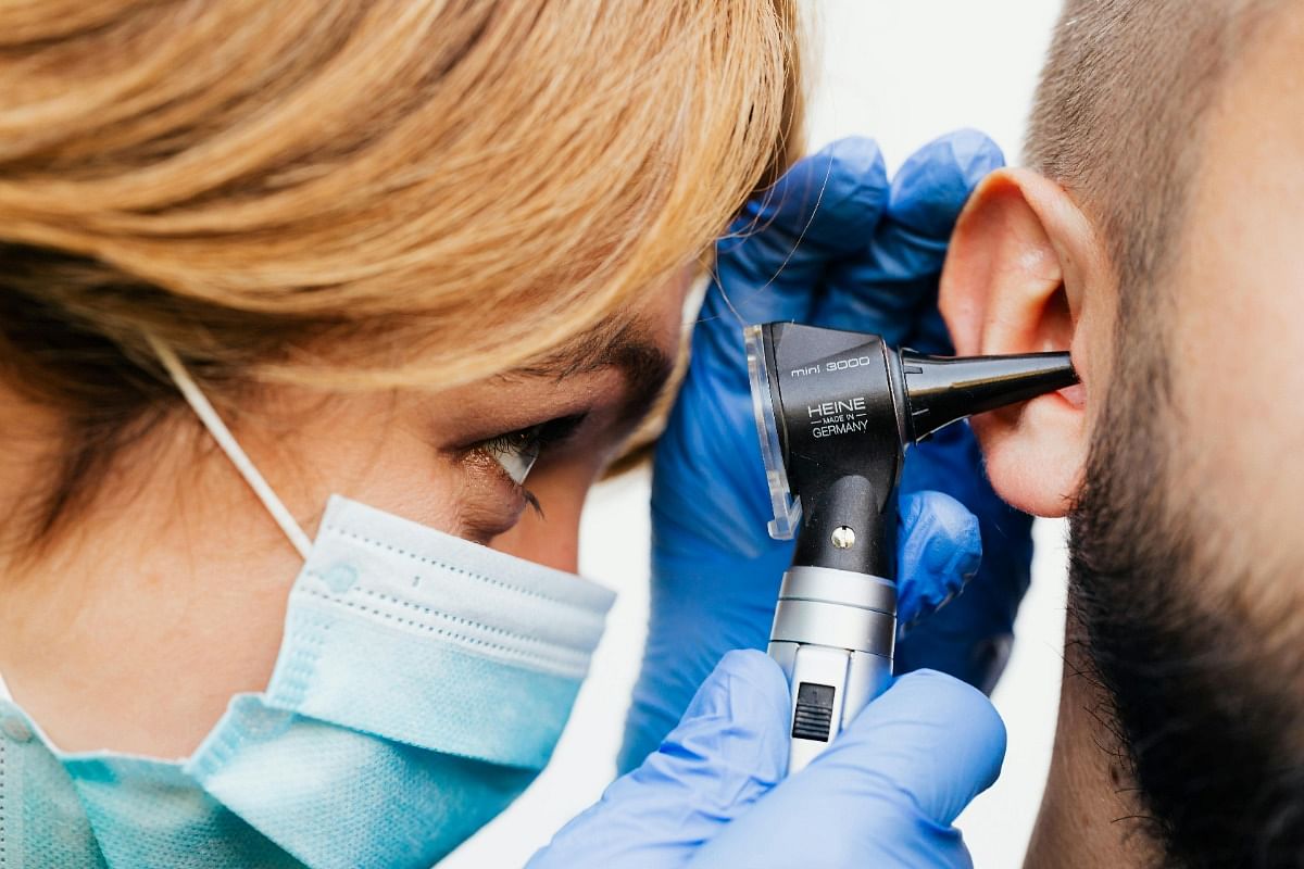 ENT looking in man\'s ear