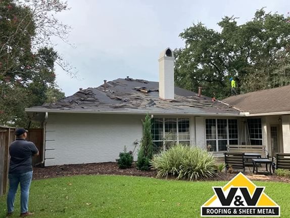 shingle roof in need of repair